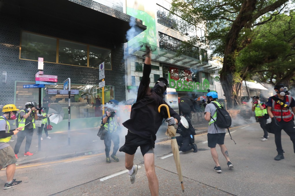 Protesters and police clashed in Tsim Sha Tsui on Sunday. Photo: Felix Wong