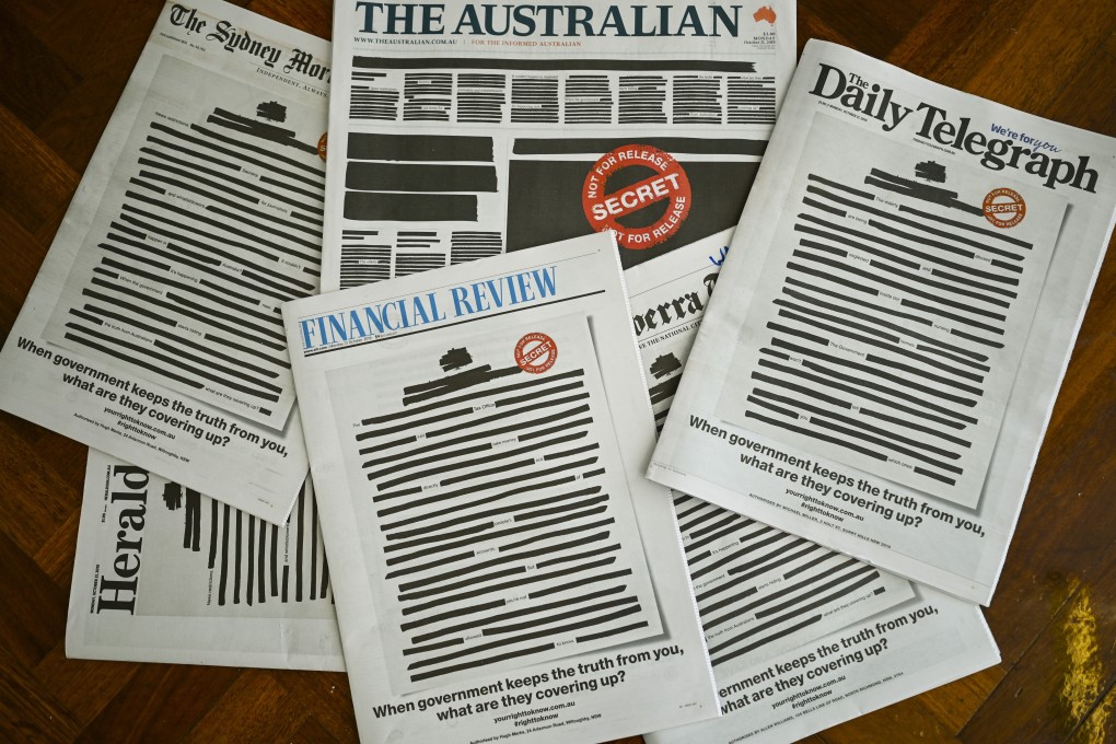 National and regional titles across Australia hit news-stands on Monday with most of their front-page news stories blacked out. Photo: EPA