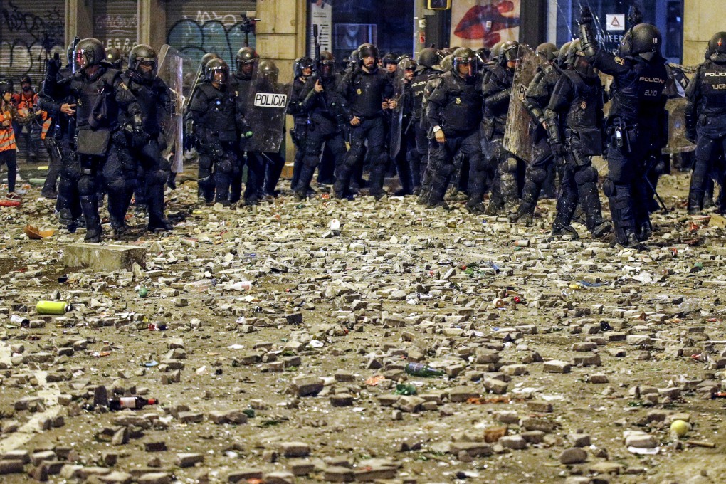 Riot police on the streets of Barcelona last week. Photo: Reuters