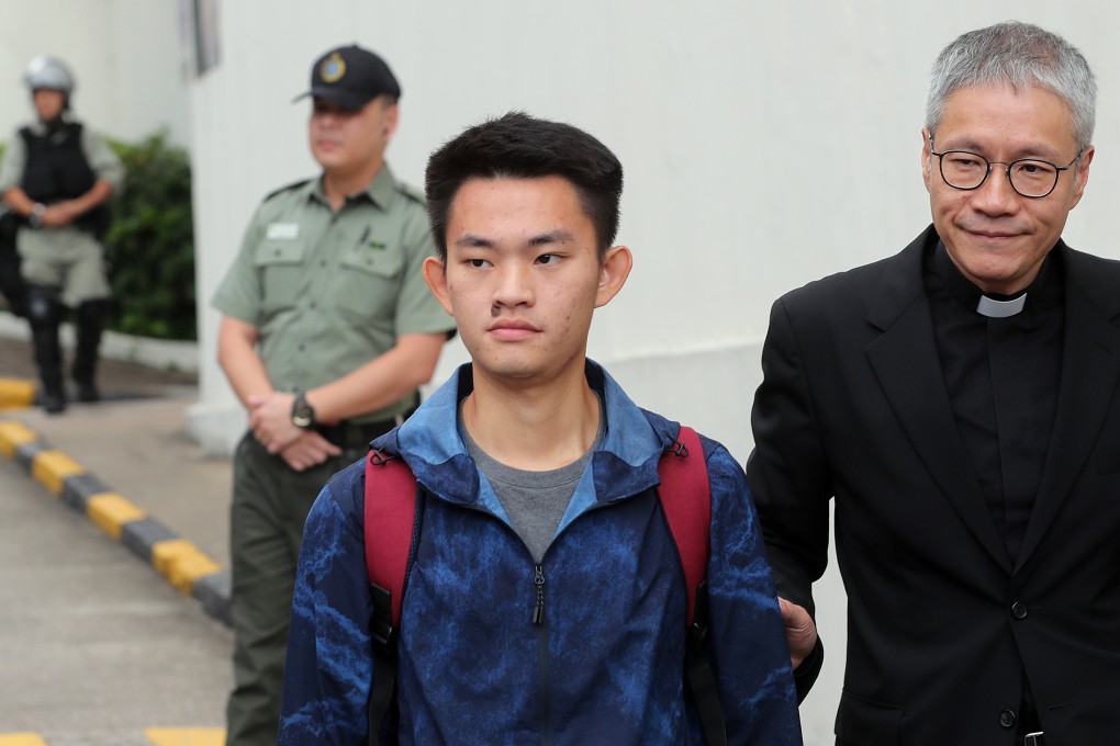 Murder suspect Chan Tong-kai, with Reverend Canon Peter Koon Ho-ming, leaves the Pik Uk Prison. Photo: Sam Tsang