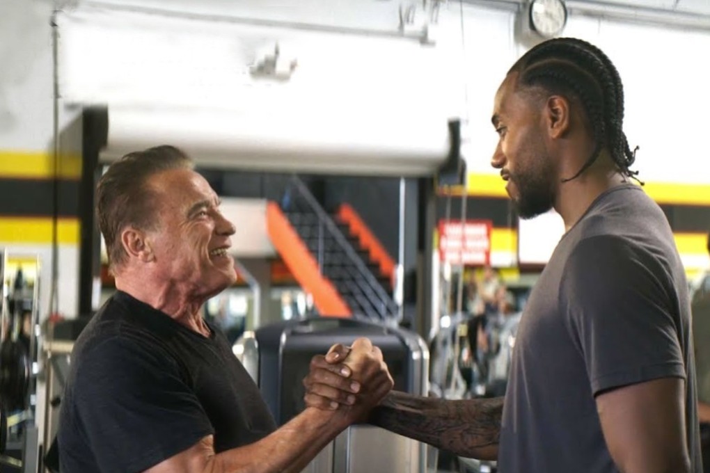 Arnold Schwarzenegger and Kawhi Leonard shake hands during the promo for Terminator: Dark Fate. Photo: Paramount Pictures