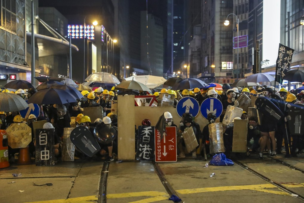 Protesters had occupied roads near Beijing’s liaison office in Sheung Wan on July 28. Photo: Sam Tsang