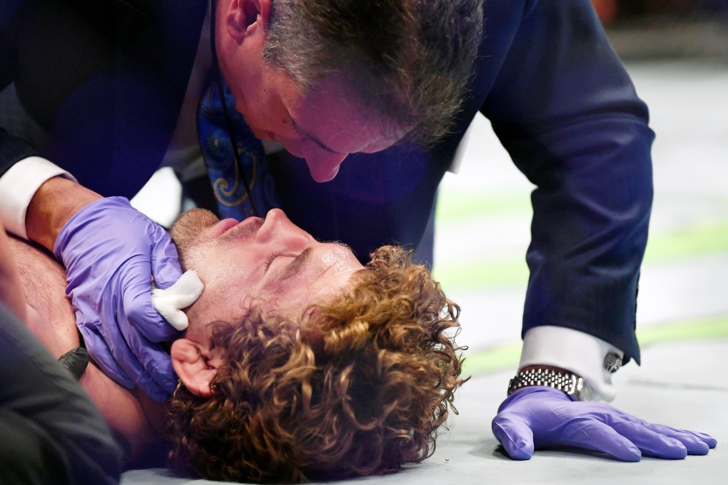 Ben Askren is assessed by medical personnel after being knocked out with a knee by Jorge Masvidal at T-Mobile Arena. Photo: USA TODAY Sports