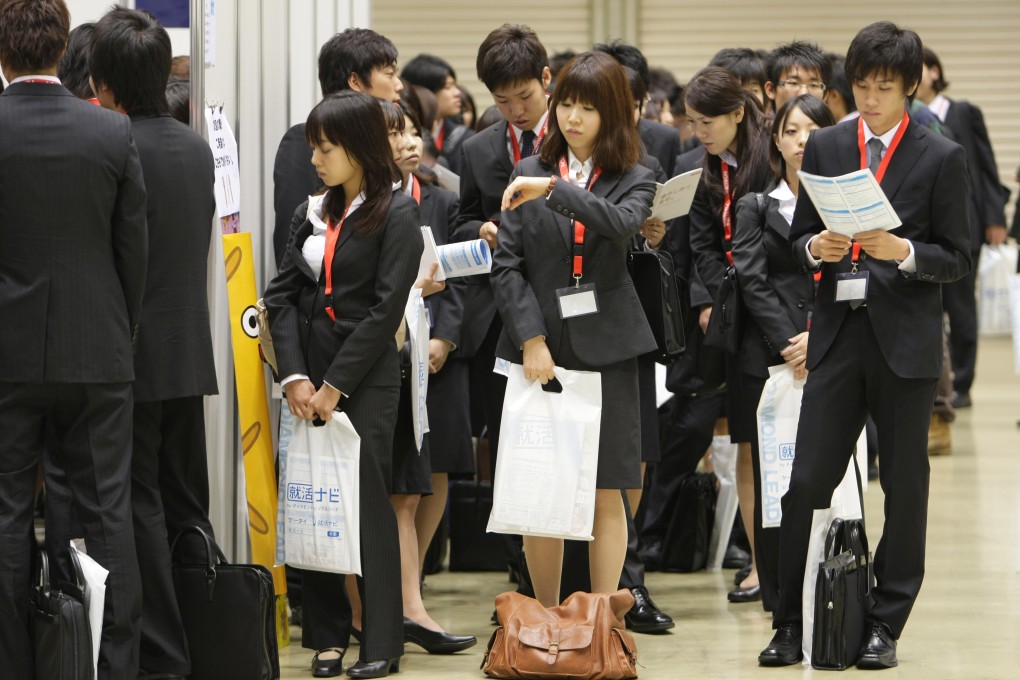 Young Japanese jobseekers attend a recruitment event ahead of their graduation. Photo: AP