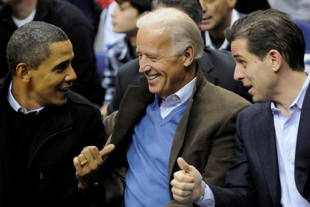 Barack Obama, the former US president, with then-vice-president Joe Biden and his son Hunter at a basketball game between Georgetown University and Duke University in Washington in 2010. Photo: Reuters