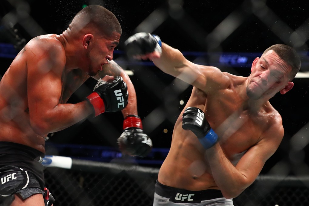 Nate Diaz throws a punch at Anthony Pettis at UFC 241. Photo: AFP