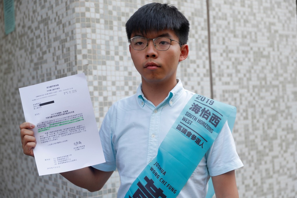 Joshua Wong, secretary-general of Hong Kong's pro-democracy Demosisto party, ready to submit his application for the race in the 2019 District Council Election. Photo: Reuters