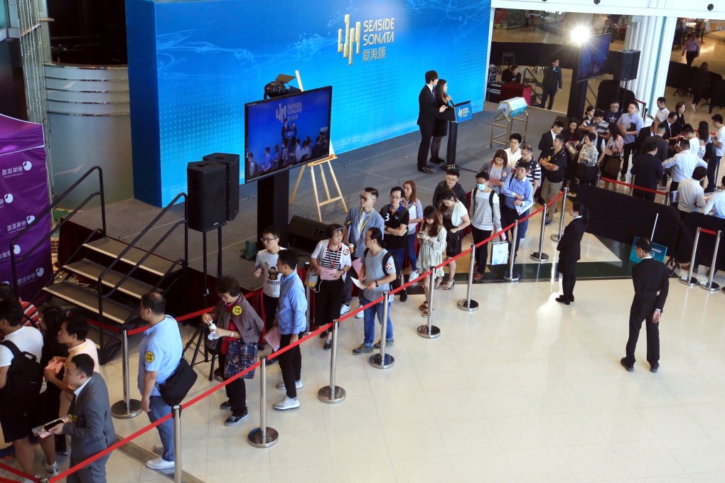 Homebuyers queue up for flats at CK Asset’s Seaside Sonata development. Photo: Handout