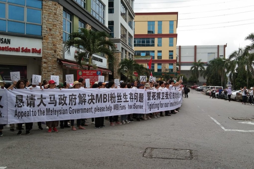 Scores of Chinese nationals staged a demonstration outside their embassy in Malaysia claiming they had lost their life savings to a local investment company. Photo: Irene Andy/Facebook
