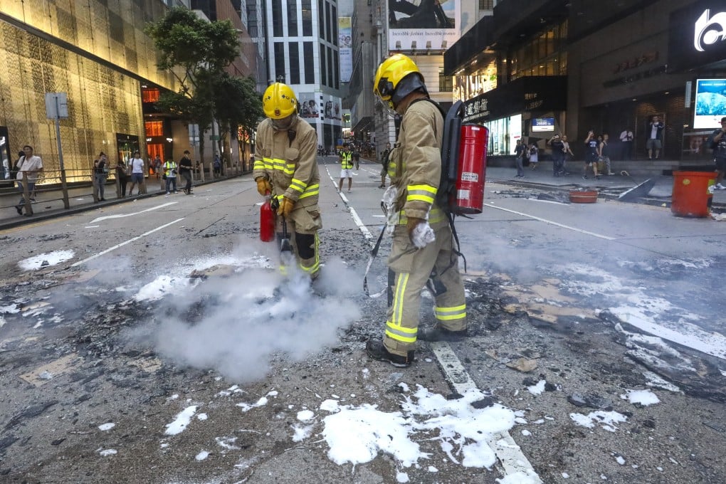 Firefighters in Central after a protest on September 8. Photo: Dickson Lee