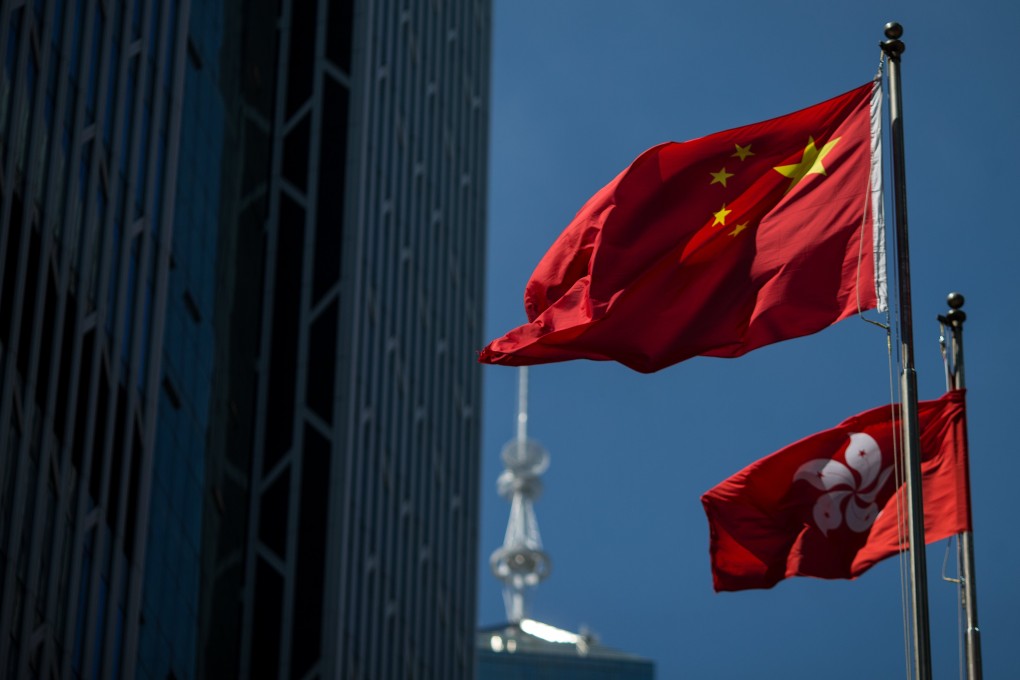 Flags of the People’s Republic of China and its Hong Kong SAR flutter over Central. It is possible for students from the mainland to have learned uncomfortable facts about their government while in Hong Kong, while retaining patriotic affection for their birthplace. Photo: EPA-EFE