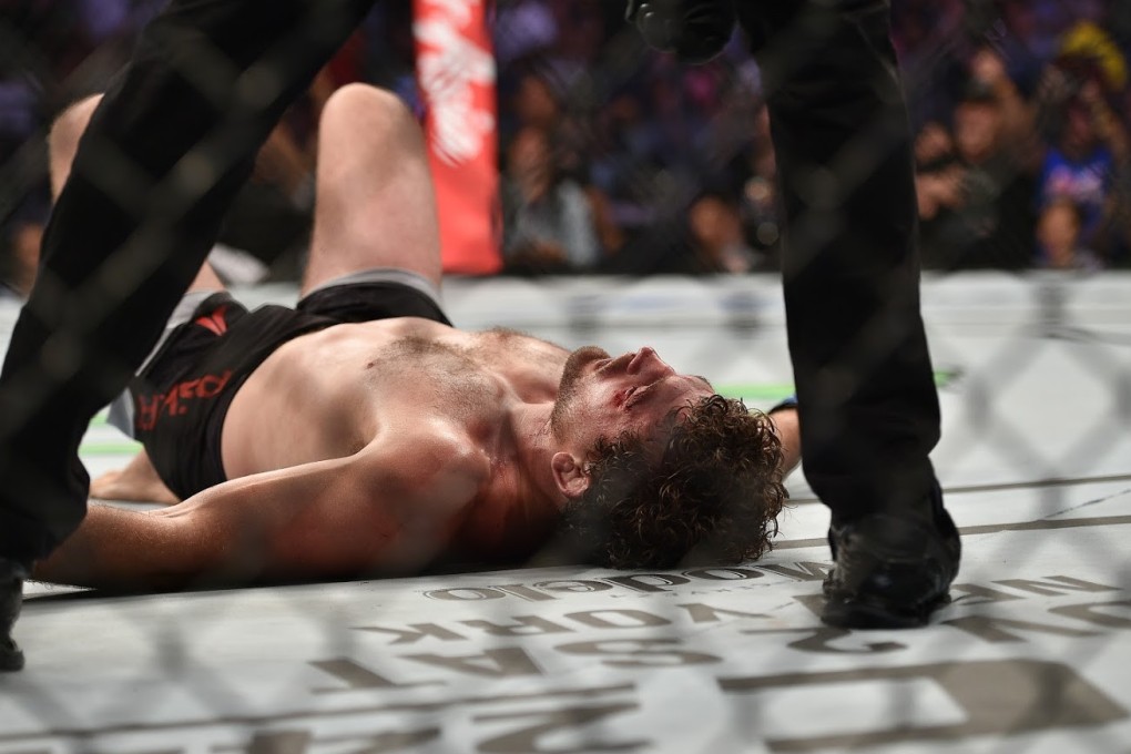 Ben Askren lies down on the canvas after tapping out to Demian Maia. Photos: SingaporeMaven