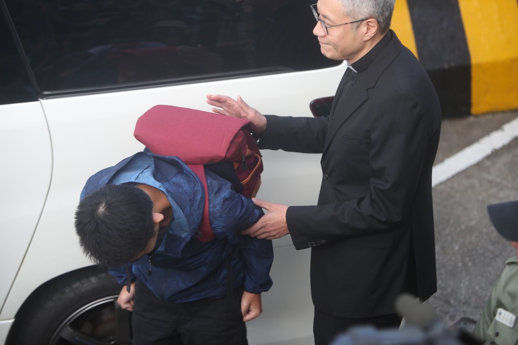Accompanied by Reverend Canon Peter Koon, murder suspect Chan Tong-kai bows in apology after being released from Pik Uk Correctional Institution, Clear Water Bay. Photo: Winson Wong