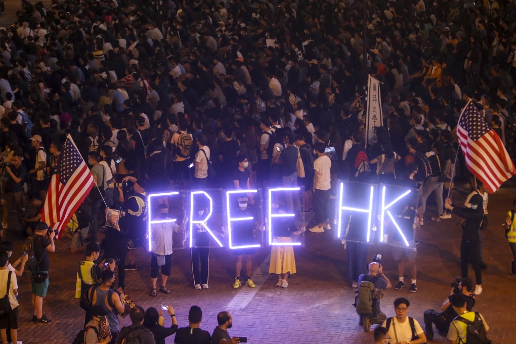 Anti-government protesters attend a prayer rally calling for international aid, at Edinburgh Place in Central. Photo: Winson Wong