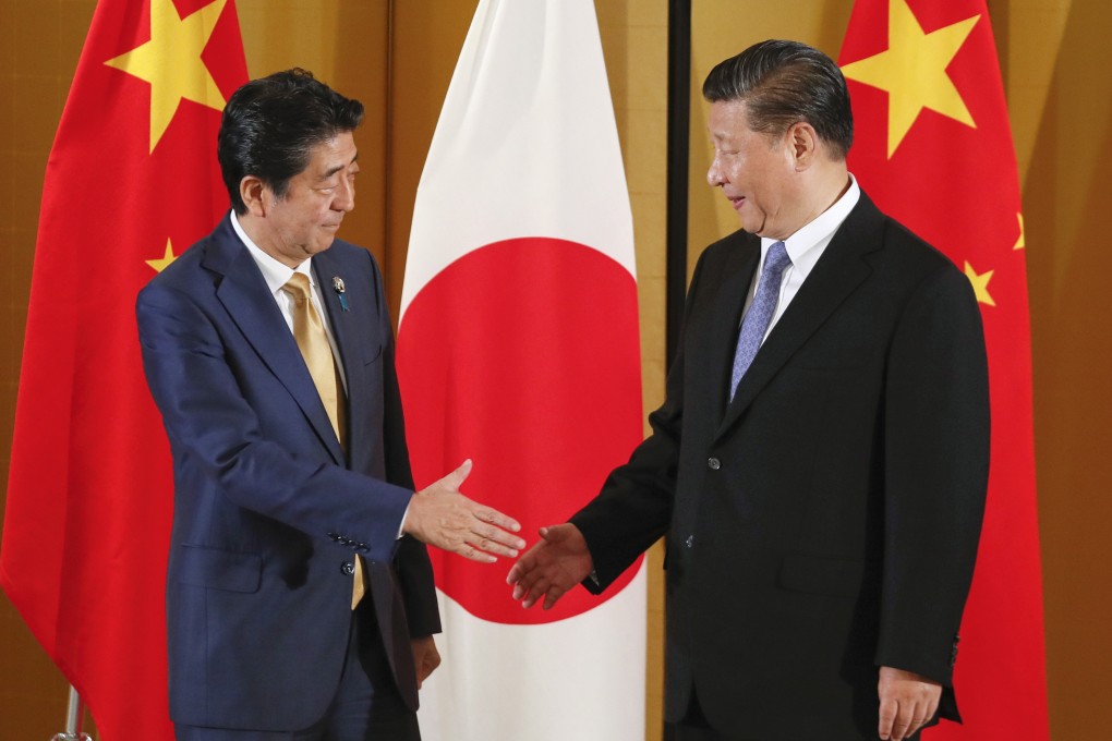 Japanese Prime Minister Shinzo Abe and Chinese President Xi Jinping. Photo: EPA