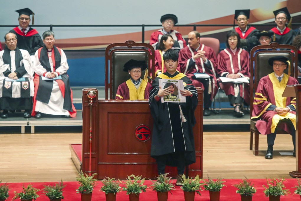 A student protests at a graduation ceremony in Lingnan University in Tuen Mun last year, with Carrie Lam in attendance. Photo: Handout