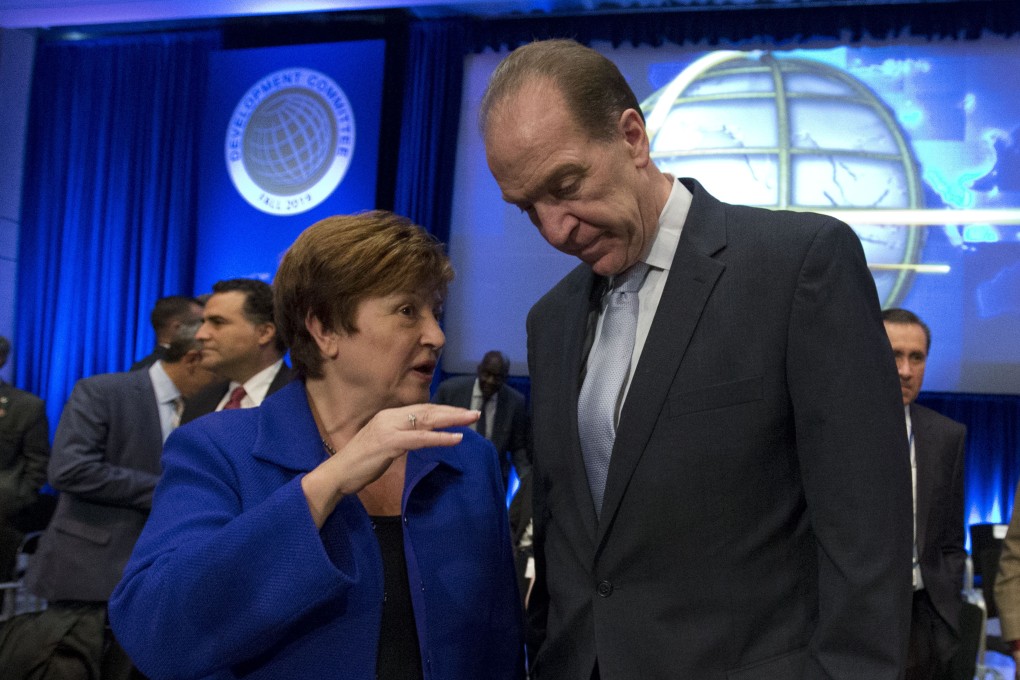 IMF managing director Kristalina Georgieva talks to World Bank president David Malpass at the World Bank/IMF Annual Meetings in Washington on October 19. Both institutions have warned of slowing global growth. Photo: AP