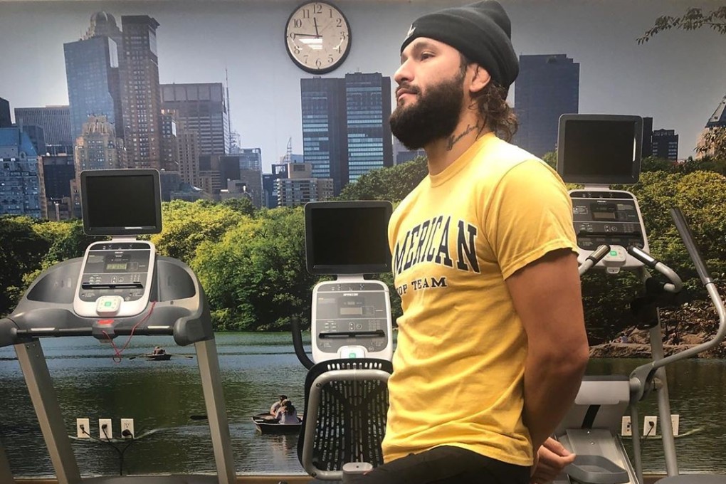 Jorge Masvidal poses in some Timberland shoes before getting some cardio in.