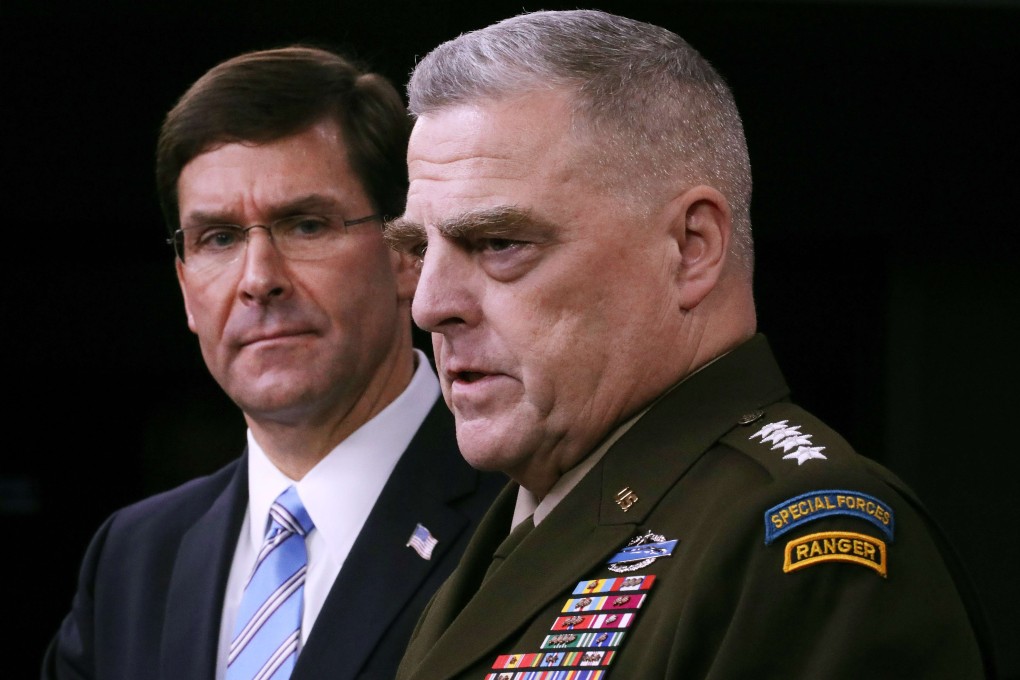 US Defence Secretary Mark Esper (left) and Chairman of the Joint Chiefs of Staff General Mark Milley hold a news conference at the Pentagon on Monday. Photo: AFP