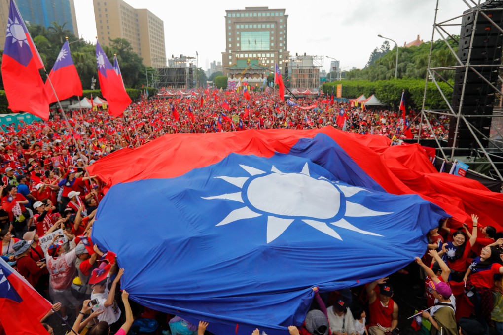 Supporters of the opposition KMT at a rally in Taipei in June. Photo: AFP