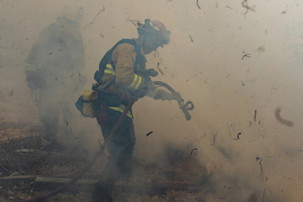 Firefighters battle the Kincade Fire in Sonoma county, California. Photo: AP