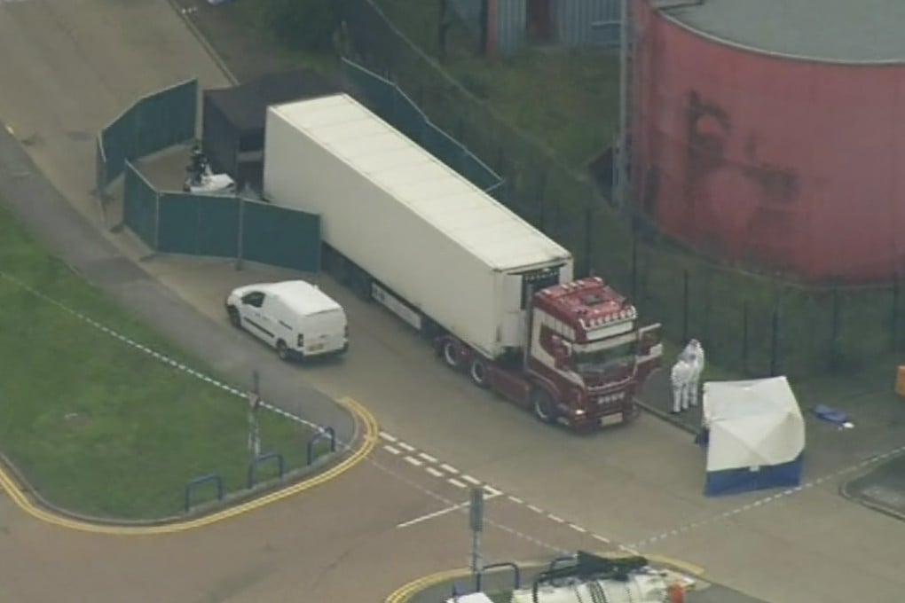 British police forensic officers at the scene after a truck was found with 39 bodies inside in Thurock, southeast England. Photo: AP