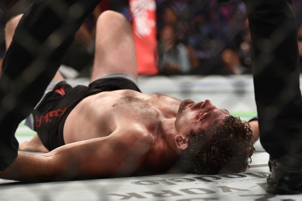 Ben Askren lies down on the canvas after tapping out to Demian Maia. Photos: SingaporeMaven