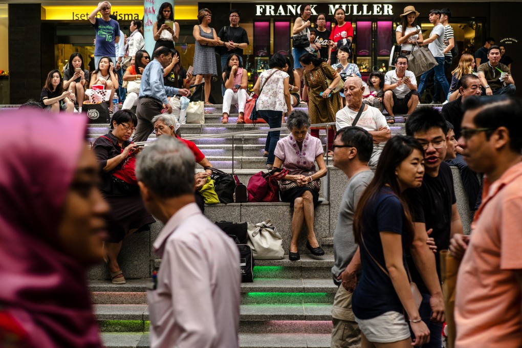 Younger Singaporeans are more sensitive to racial and religious fallout, according to a study. Photo: Bloomberg