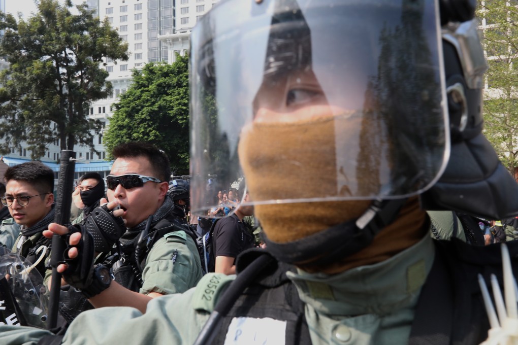 Anti-riot police in action during an anti-government protest in Tsim Sha Tsui. Photo: Felix Wong