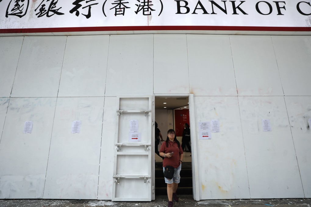 Many Bank of China branches have been fortified against possible attacks by protesters. Photo: Dickson Lee