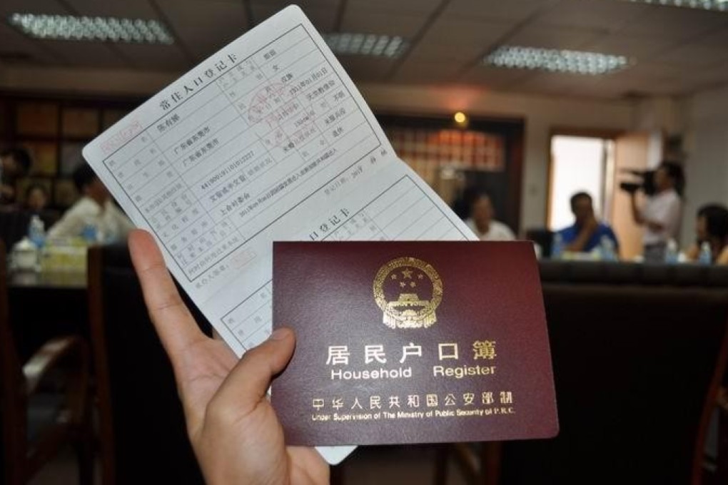Critics have long described China’s hukou system as a form of internal passport that limits freedom of movement among rural residents. Photo: newsgd.com