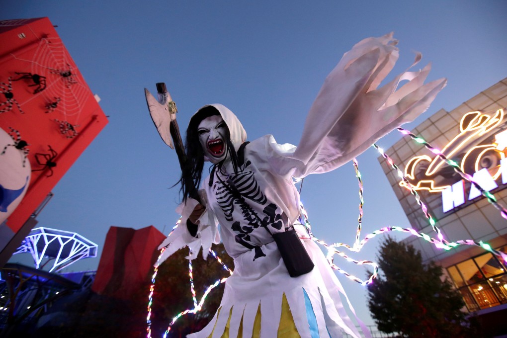 A Halloween partygoer in costume attends a festive event in Beijing last year. Photo: Reuters