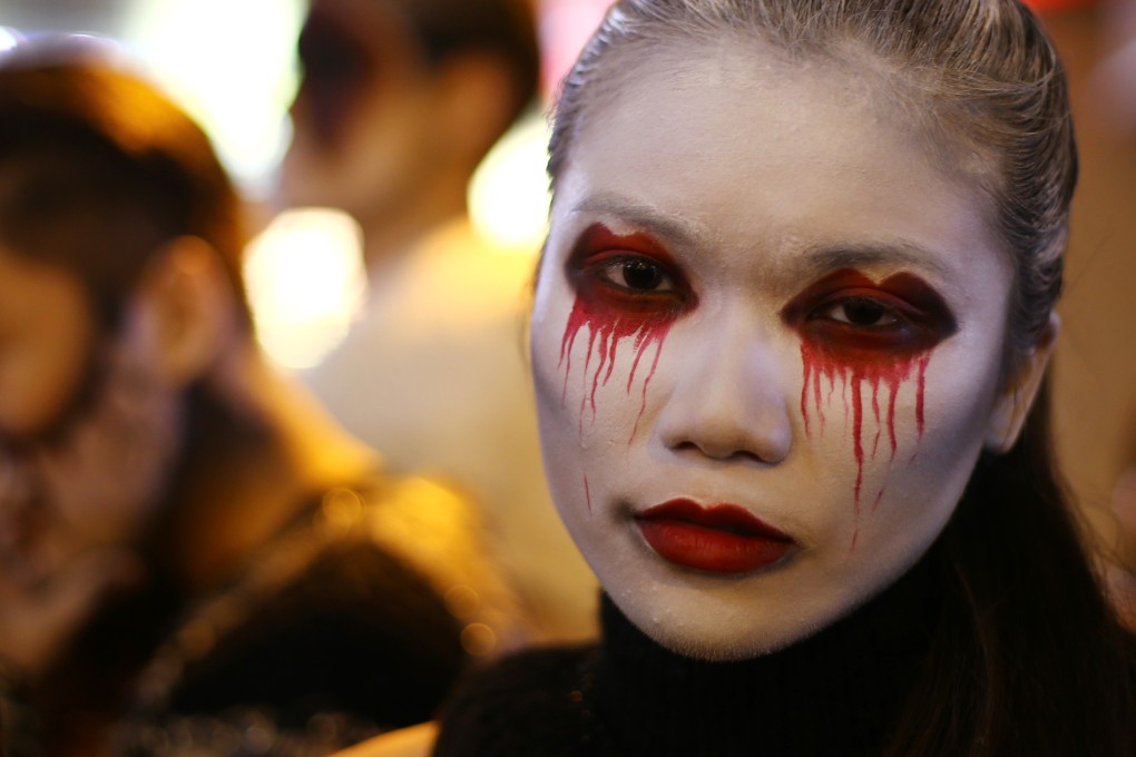 Revellers in Lan Kwai Fong will be asked to remove make-up if it hinders identification on Thursday night, a senior police officer said. Photo: Felix Wong