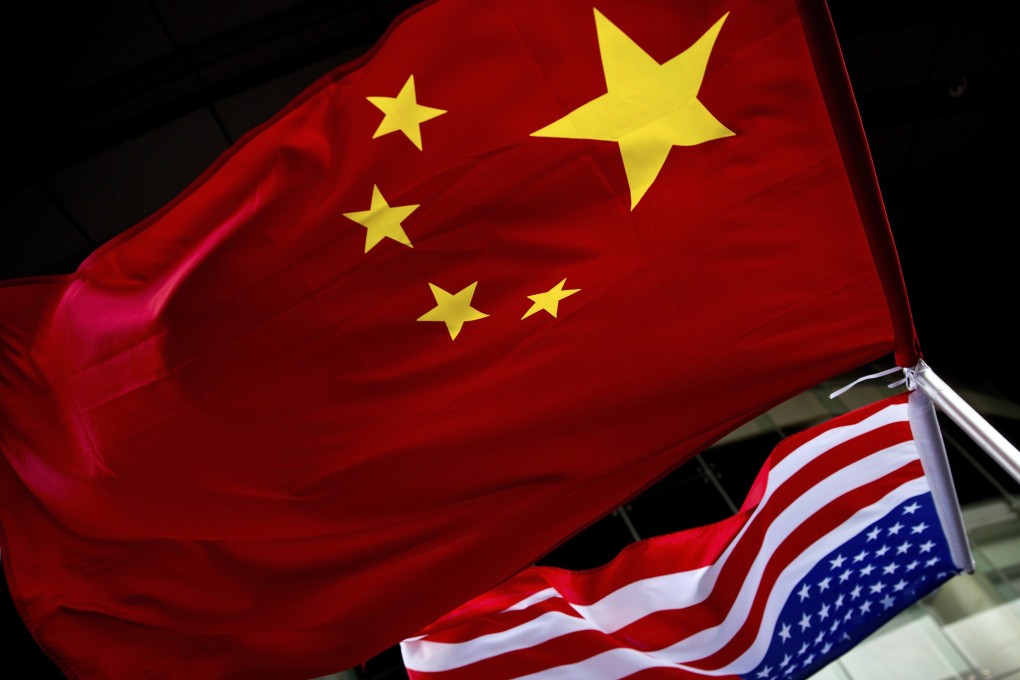 US and Chinese flags are hung outside a hotel during an event at the US embassy in Beijing in November 2012. Photo: AP