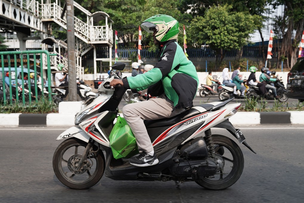 A Grab driver makes a delivery in Jakarta, Indonesia. Photo: Bloomberg