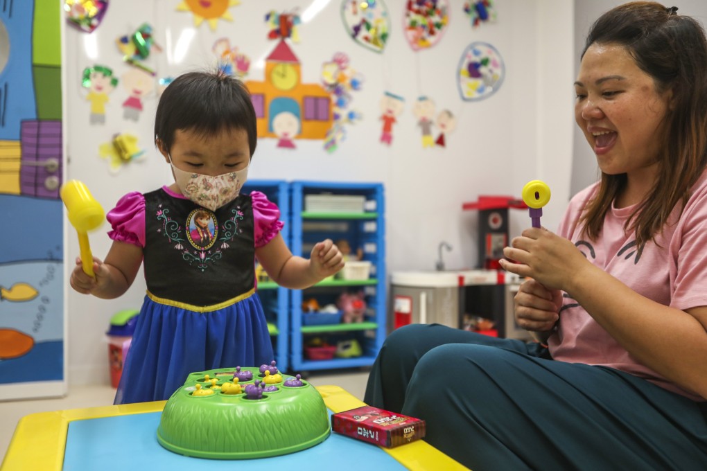 Anna Chung and her daughter Pang Ho-wing, play together at the Children's Cancer Foundation Family Service Centre in Cheung Sha Wan. Photo: Xiaomei Chen