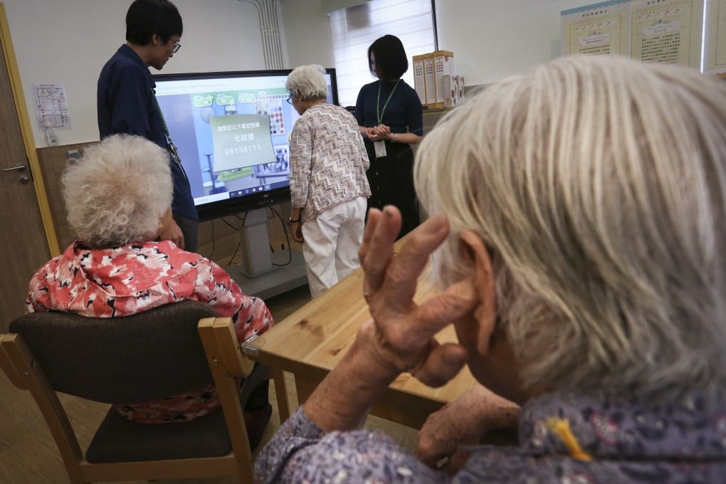 Seniors playing brain-training games at the Hong Kong Society for the Aged Fong Shu Chuen Centre. Photo: Jonathan Wong