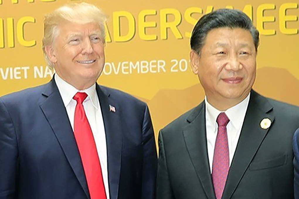 Donald Trump and Xi Jinping pictured at the 2017 Apec summit in Vietnam. Photo: AFP