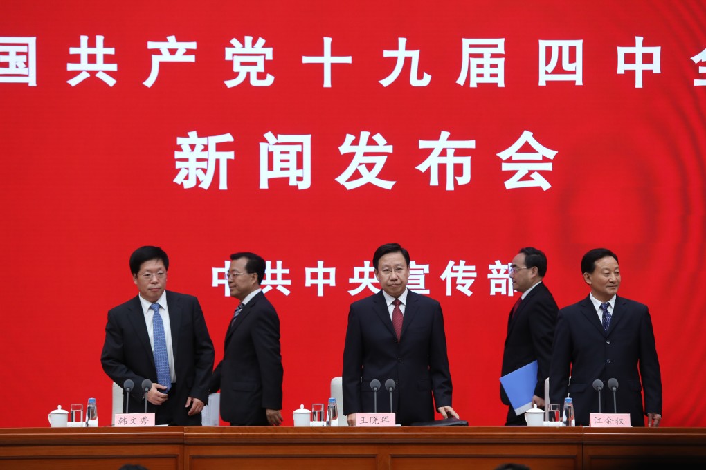 Officials take questions from media about the Communist Party’s fourth plenary session in Beijing on Friday. Photo: Simon Song