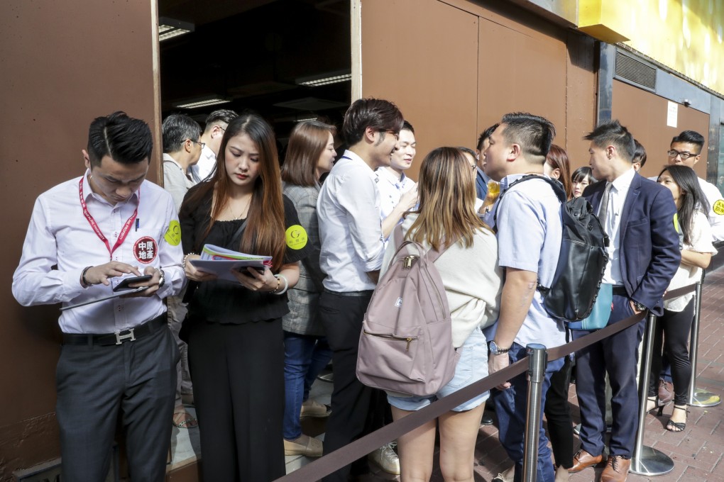 Property buyers lining up for The Grand Marine project at the sales office in Railway Plaza, Tsim Sha Tsui. Photo: Edmond So