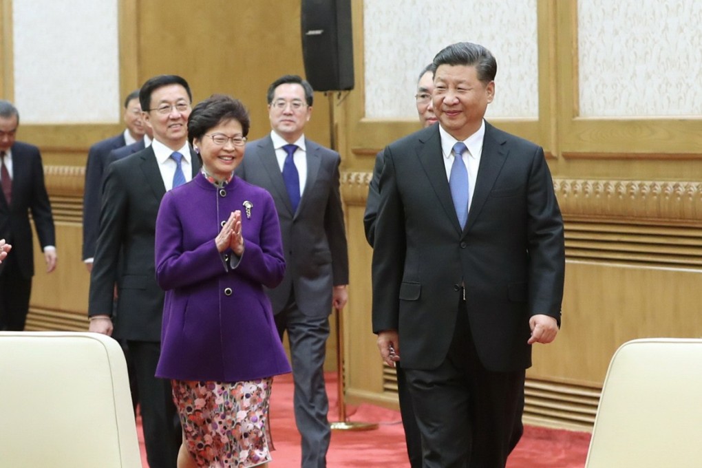 Chief Executive Carrie Lam leads the way for delegates from Hong Kong and Macau, as Chinese President Xi Jinping meets representatives from the two special administrative regions, in Beijing in November 2018. Photo: Xinhua
