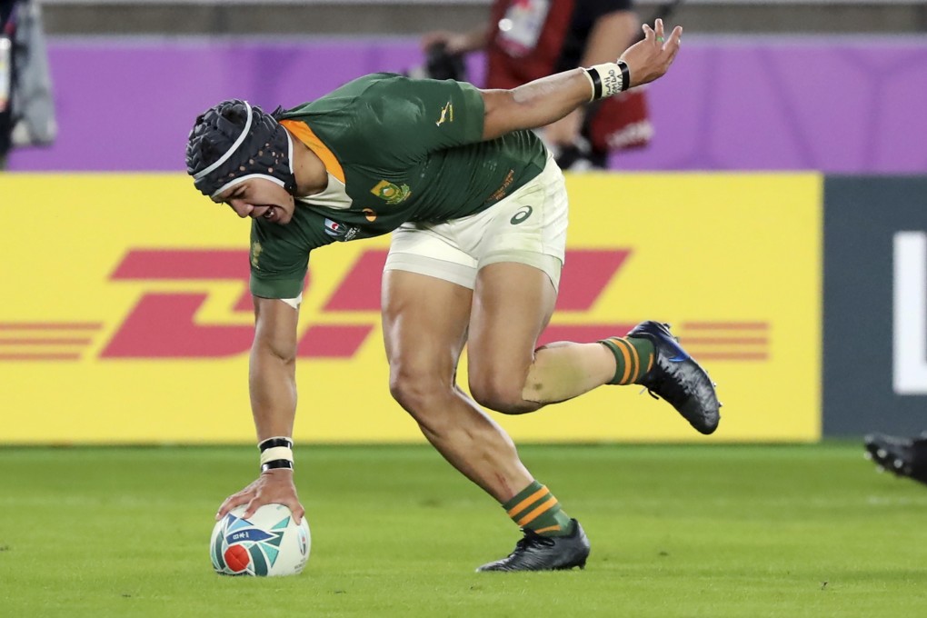 South Africa's Cheslin Kolbe scores a try against England during the Rugby World Cup final. Photo: AP