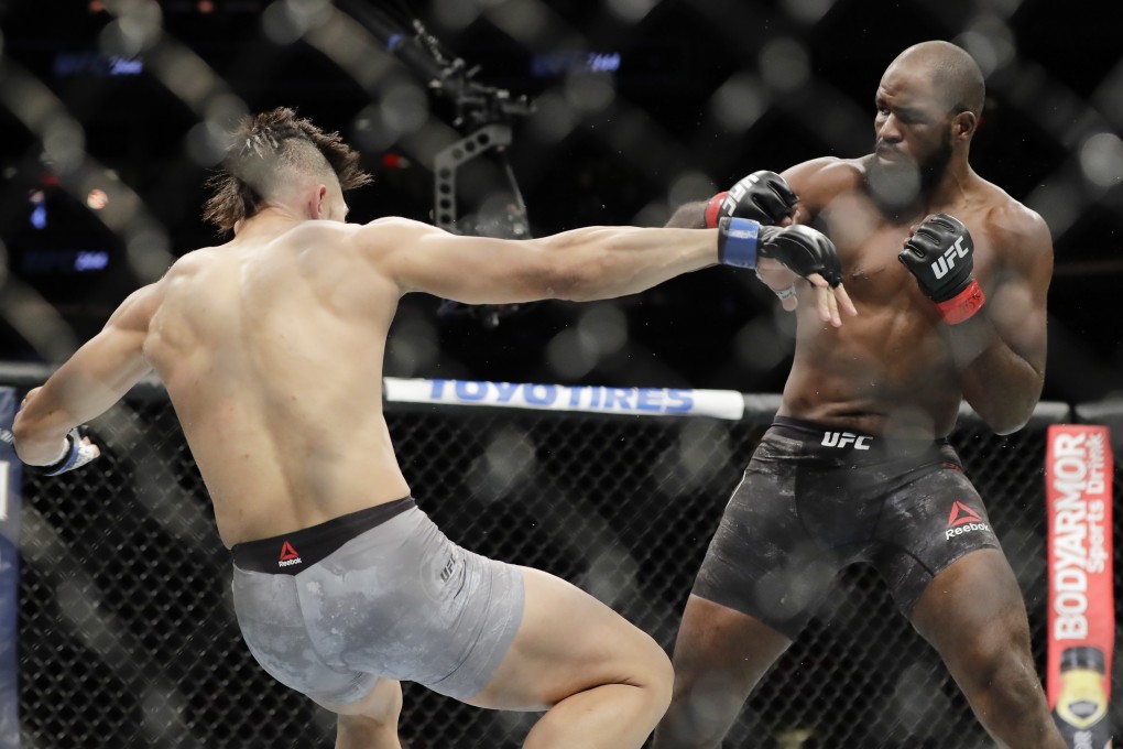 Corey Anderson knocks down Johnny Walker at UFC 244. Photo: AP