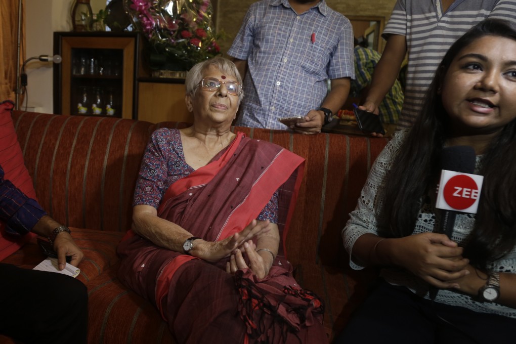 Nirmala Banerjee being interviewed at her home in Kolkata. Photo: AP