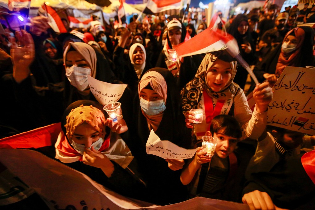 Iraqi women take part at an anti-government protest in the holy city of Najaf. Photo: Reuters