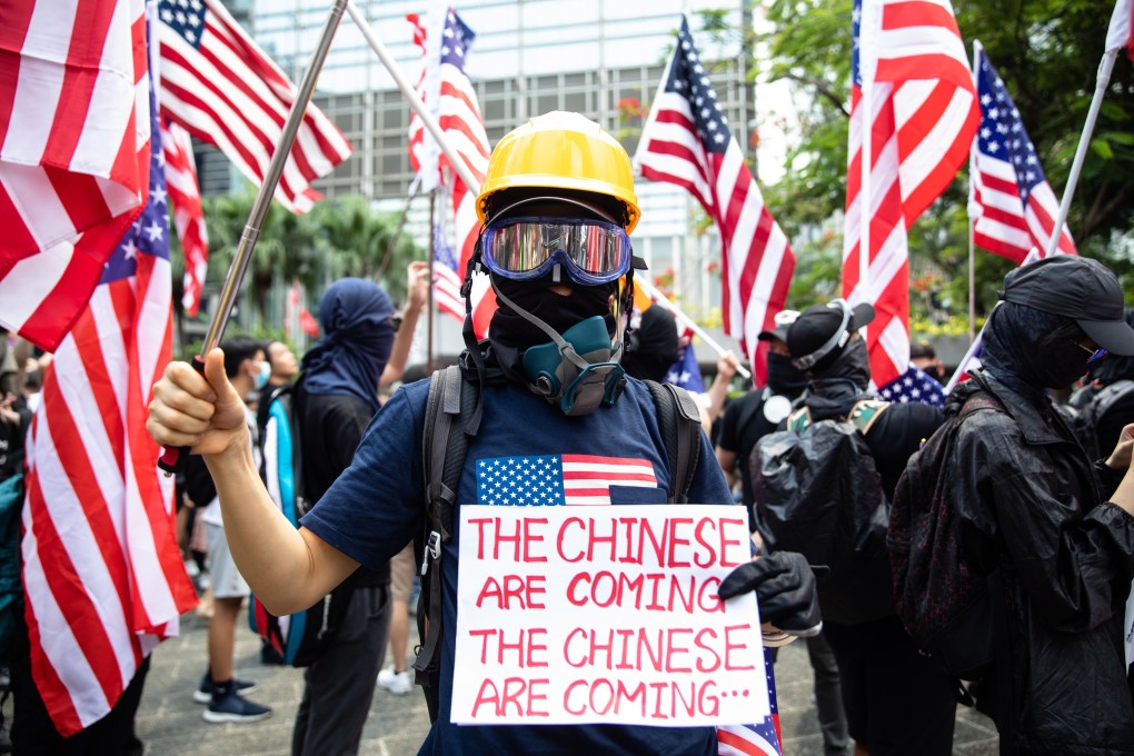 A protester takes part in a rally to petition the US Congress to pass the Hong Kong Human Rights and Democracy Act, in Central on September 8. Photo: Bloomberg