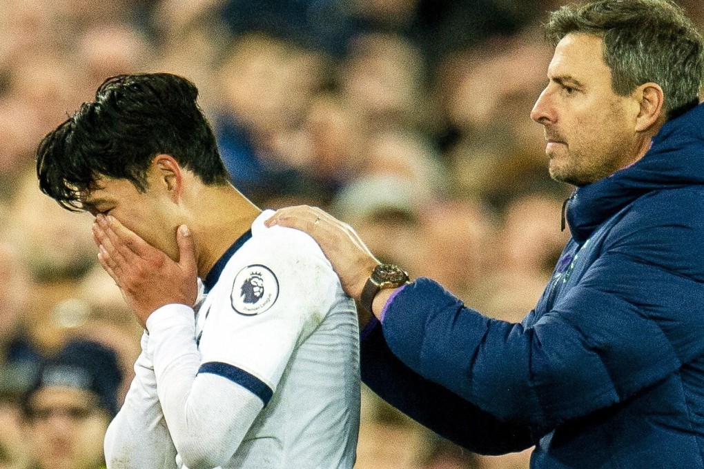 Tottenham Hotspur's Son Heung-min is distraught after his tackle on Everton's Andre Gomes. Photo: EPA