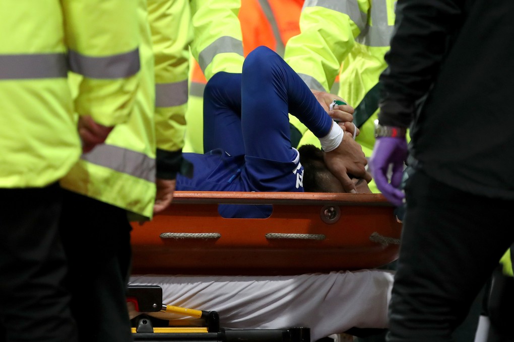 Everton’s Andre Gomes is carried off Goodison Park after the sickening injury. Photo: PA