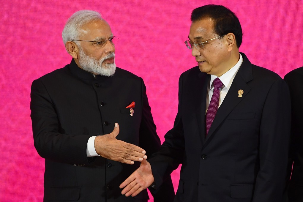 Indian Prime Minister Narendra Modi and China’s Premier Li Keqiang attend the Regional Comprehensive Economic Partnership Summit in Bangkok. Photo: AFP