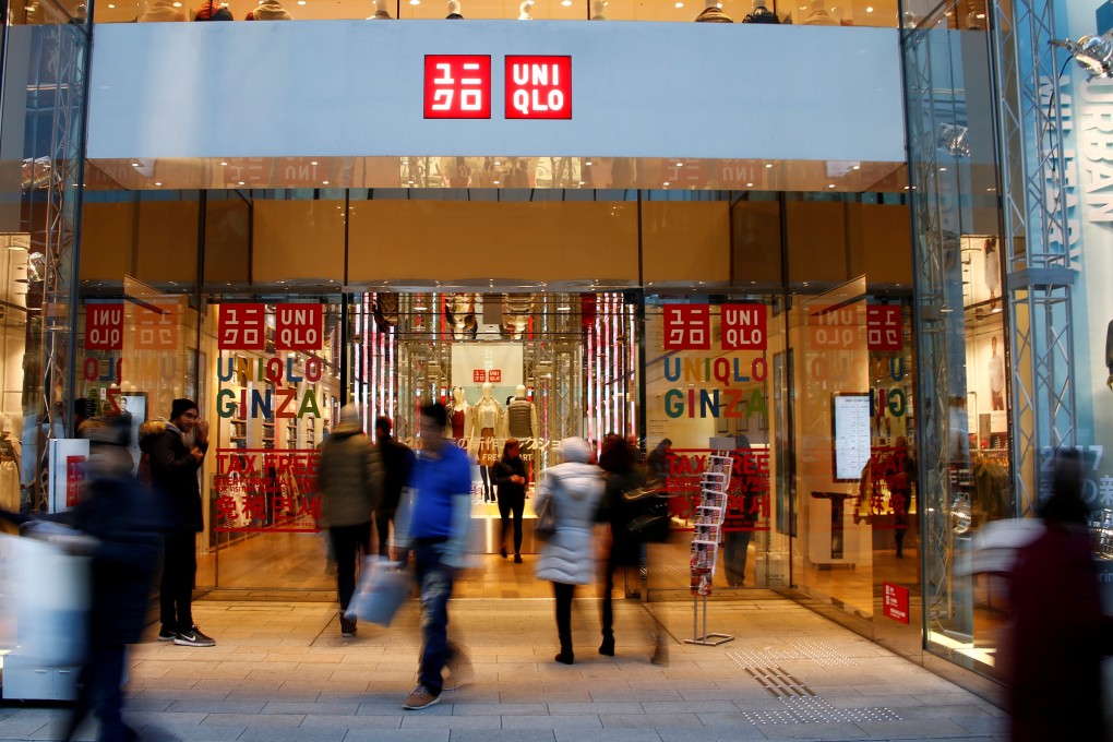 Shoppers outside Uniqlo in Tokyo. Photo: Reuters
